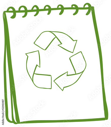 A green notebook with the symbols for recycling