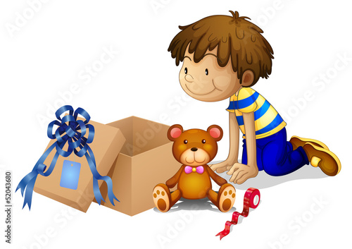 A boy looking at the box