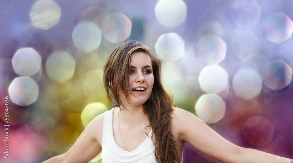 Happy girl on background of the bokeh Happy girl on background of the bokeh