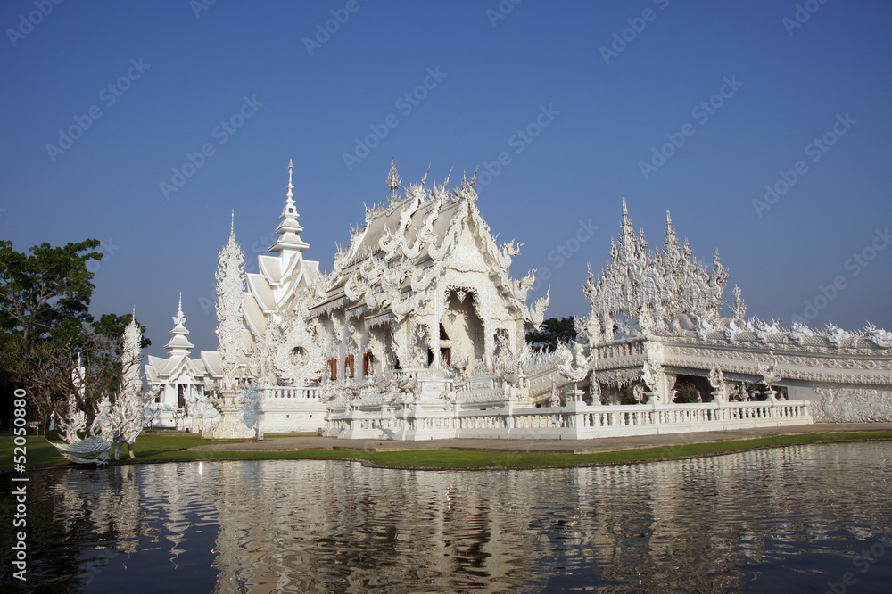 Modern Buddhist sculpture,..White temple in Thailand.