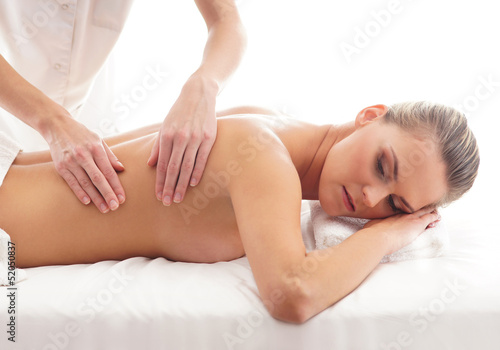 Young attractive woman getting spa treatment