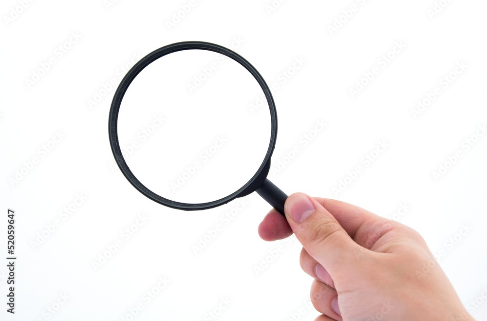 Hand holding magnifier isolated on white Hand holding magnifier isolated on white