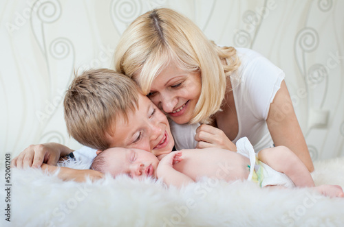 happy family with newborn b...