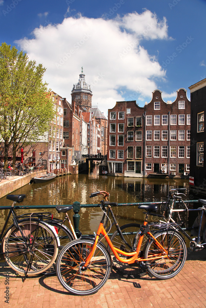 Amsterdam city with bikes on the bridge, Holland