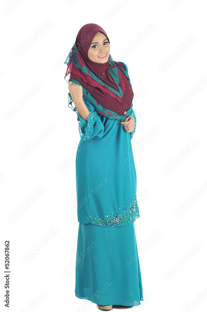Young Muslim woman in head scarf with modern clothes, isolated on white Young Muslim woman in head scarf with modern clothes, isolated on white