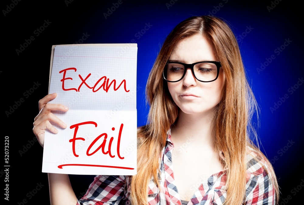 Failed test or exam and disappointed girl Failed test or exam and disappointed girl