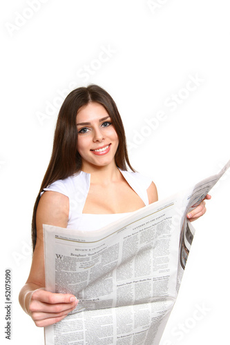 Attractive business woman reading a newspaper on a white backgro