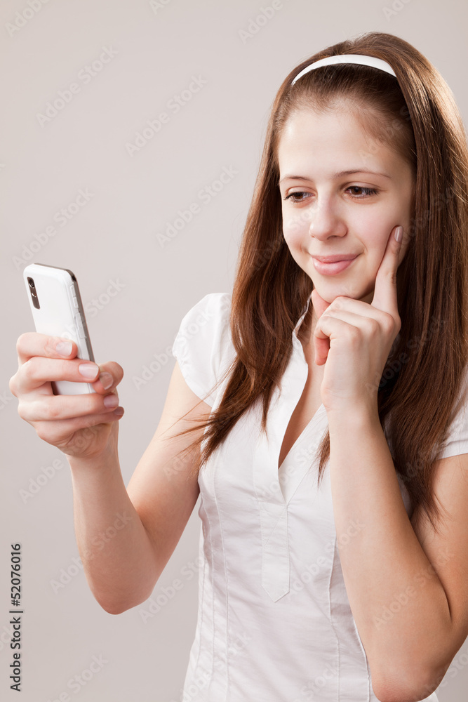 Teenager girl and mobile phone