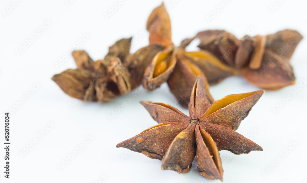 A group of dried star anise spice. A group of dried star anise spice.