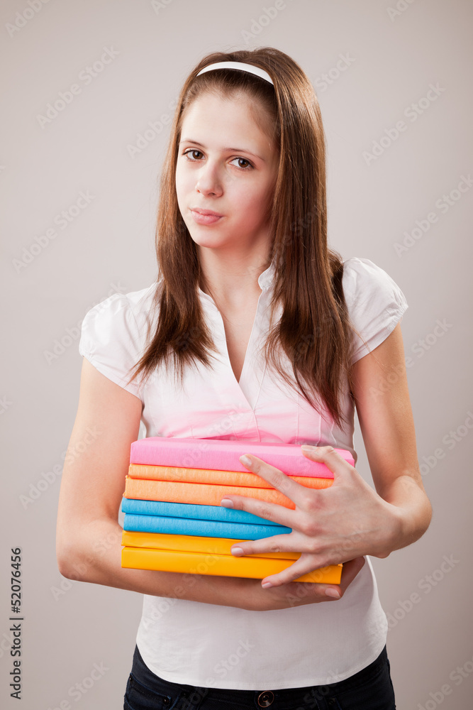 Teenager girl with books Teenager girl with books