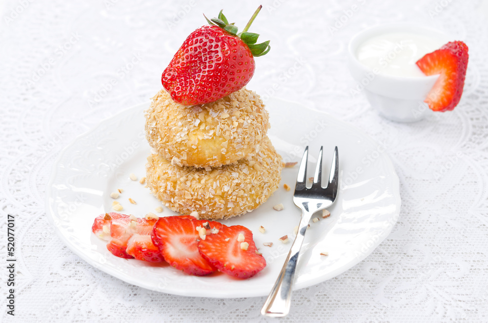 cheese pancakes with fresh strawberries and yogurt