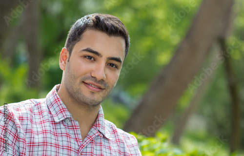Gorgeous young attracive man in nature