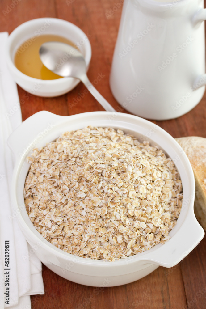 cereals in bowl with honey and milk cereals in bowl with honey and milk