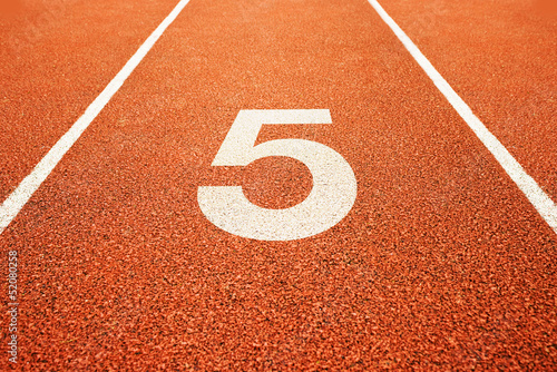 number five on running track © Bits and Splits