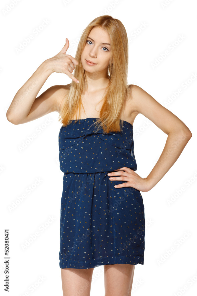 Young girl making a call me gesture Young girl making a call me gesture