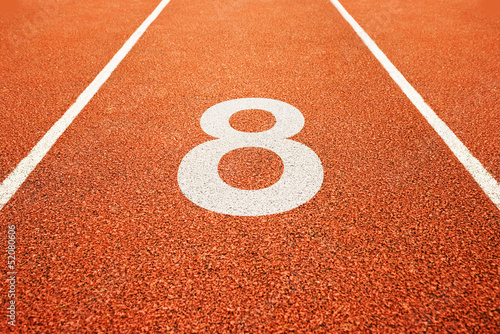 number eight on running track photo