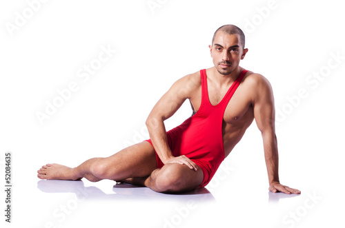 Young wrestler isolated on the white