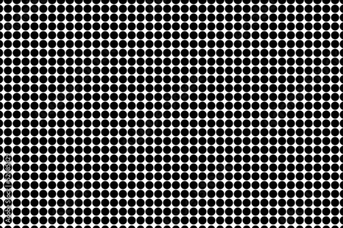 trame de ronds noirs sur fond blanc