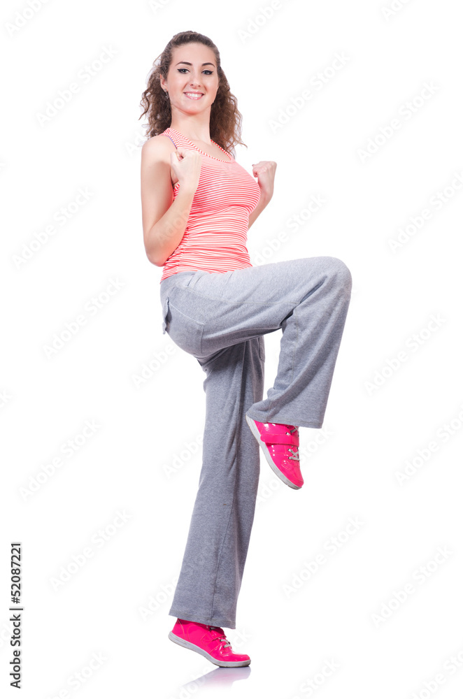 Young female doing exercises on white Young female doing exercises on white
