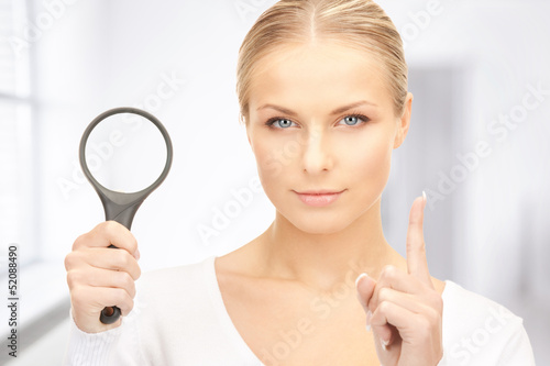 woman with magnifying glass