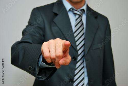 Businessman pressing an imaginary button