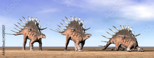 Kentrosaurus dinosaurs in the desert - 3D render © Elenarts