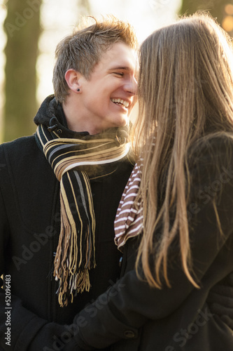 outdoor portrait of  couple smiling photo