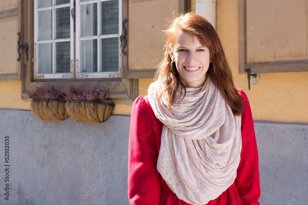 portrait of redhaired girl walking in the street portrait of redhaired girl walking in the street