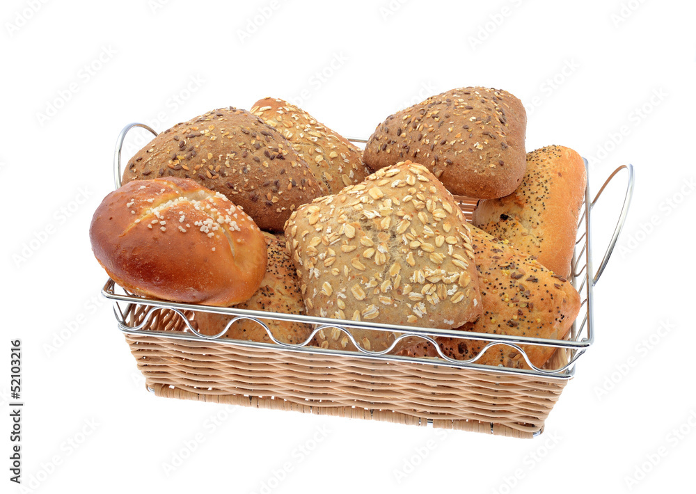 whole grain and white rolls in basket isolated on white whole grain and white rolls in basket isolated on white