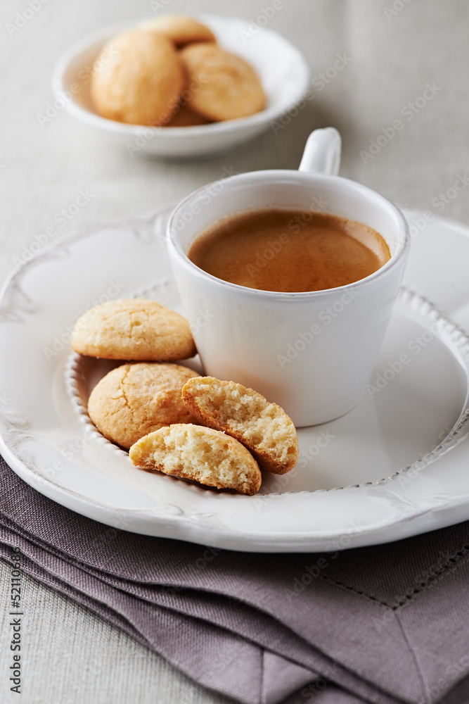 Cup of espresso with biscotti (focus on biscotti) Cup of espresso with biscotti (focus on biscotti)
