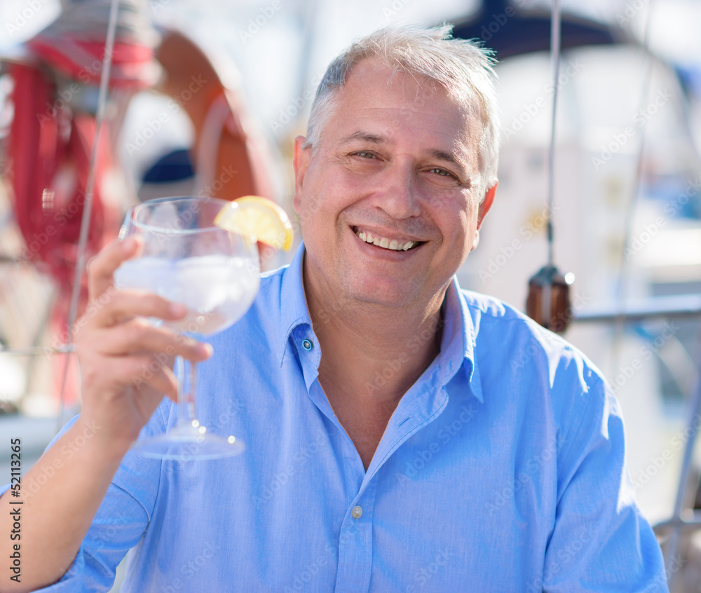 Mature Man enjoying fresh lemonade Mature Man enjoying fresh lemonade