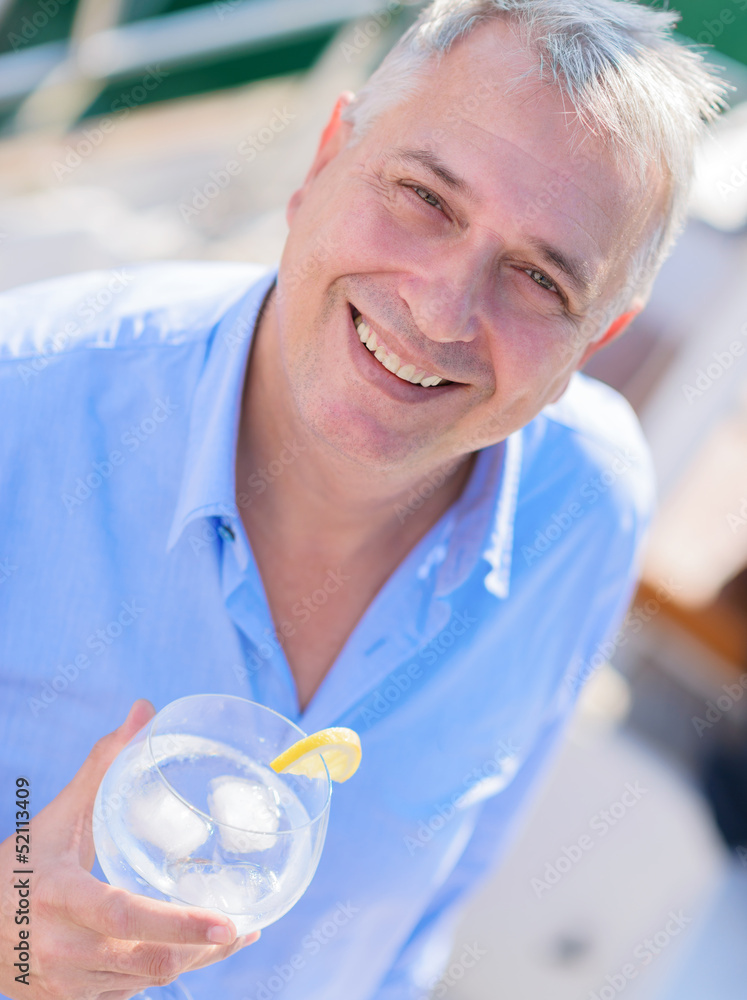 Mature Man enjoying fresh lemonade Mature Man enjoying fresh lemonade