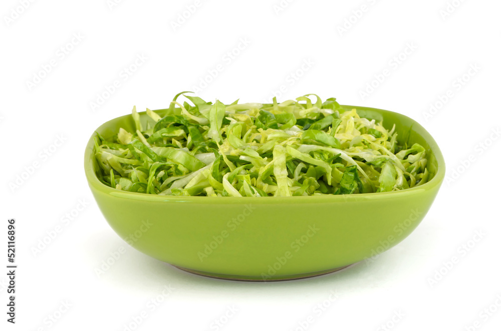 Fresh salad in green plate on a white background Fresh salad in green plate on a white background