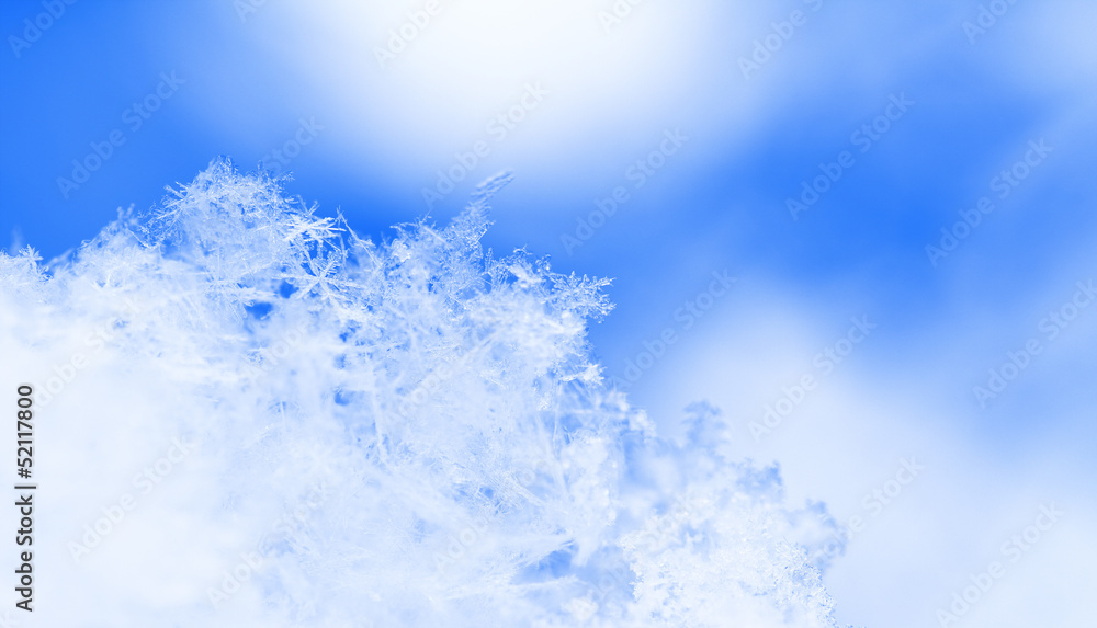 Snowflake in blue snow Snowflake in blue snow