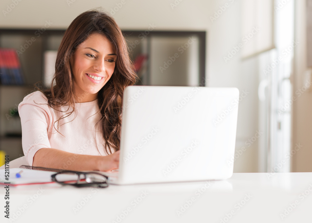Fototapeta premium Young Woman Using Laptop