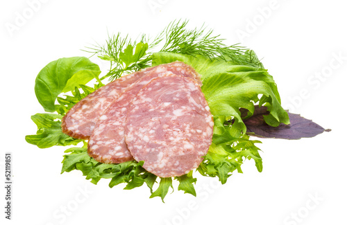 Sausages with salad and basil