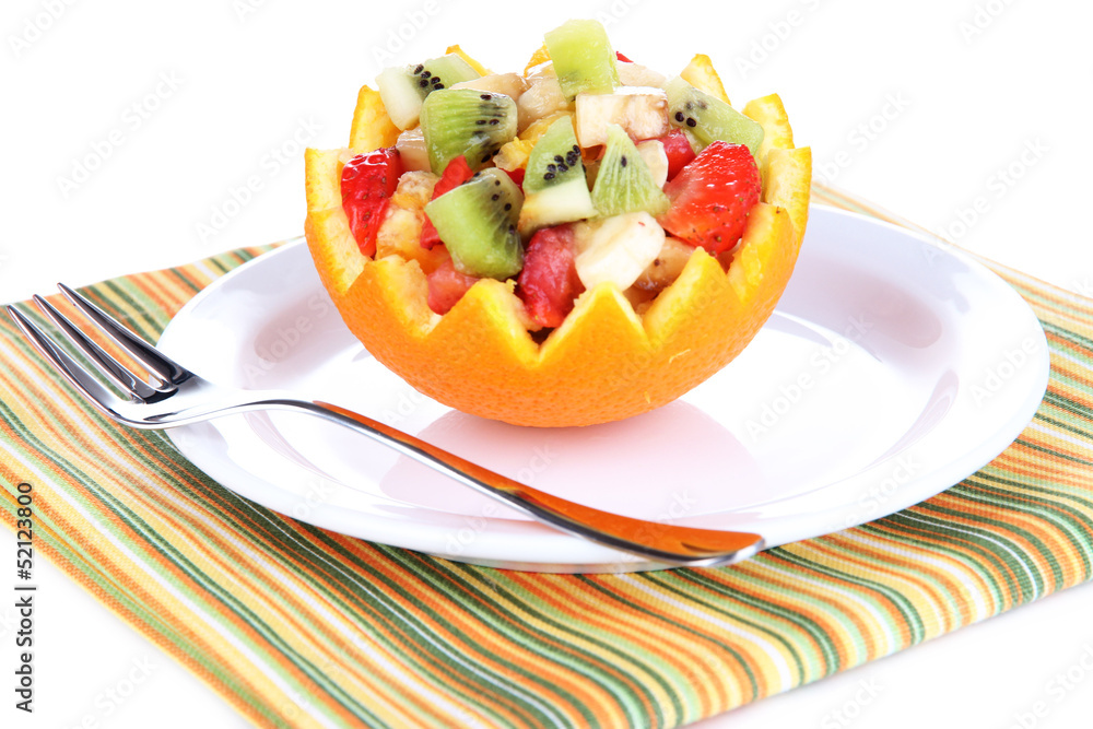 Fruit salad in hollowed-out orange isolated on white Fruit salad in hollowed-out orange isolated on white