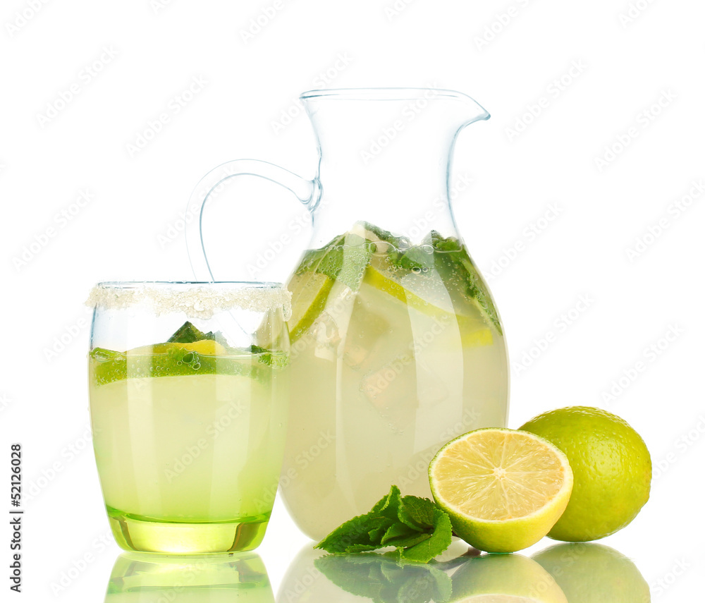 Lemonade in pitcher and glass isolated on white Lemonade in pitcher and glass isolated on white