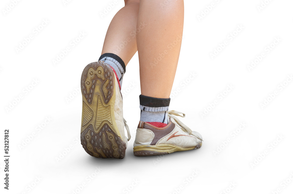 woman walking, sport shoe closeup woman walking, sport shoe closeup