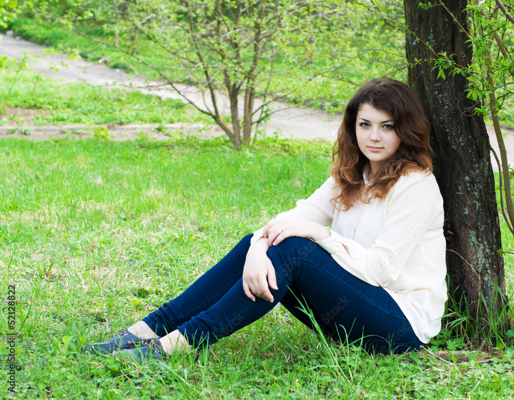 young girl in the spring garden young girl in the spring garden