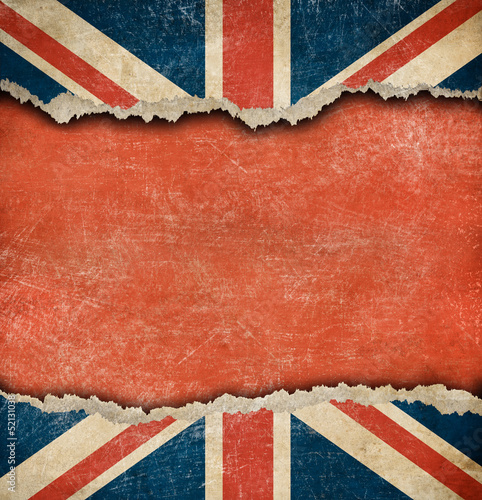 Grunge British flag on ripped paper with big empty space photo