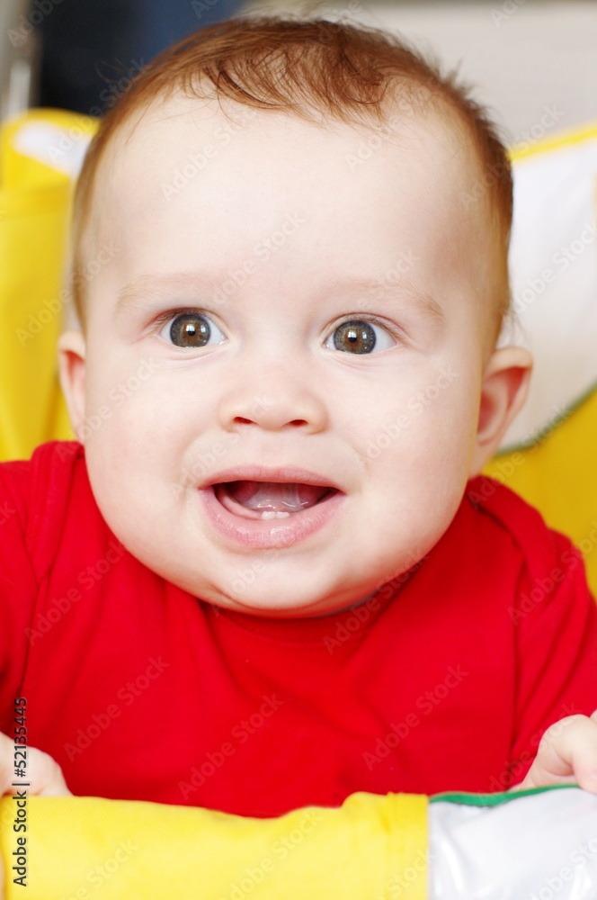 happy baby in a yellow baby carriage happy baby in a yellow baby carriage