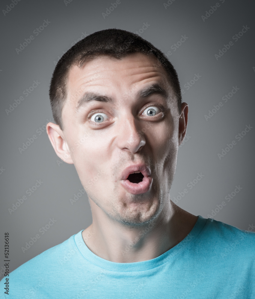 young man surprised young man surprised