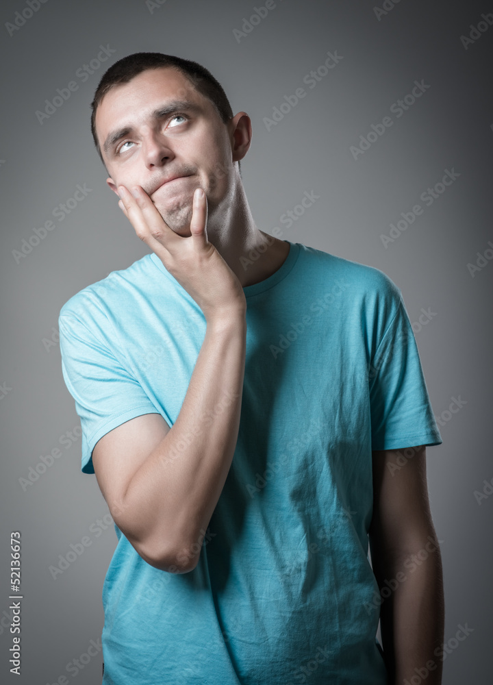 young man thinking young man thinking