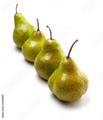 Four pears in a row on white