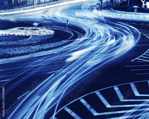 Canvas Print the light trails on the modern building background in shanghai china