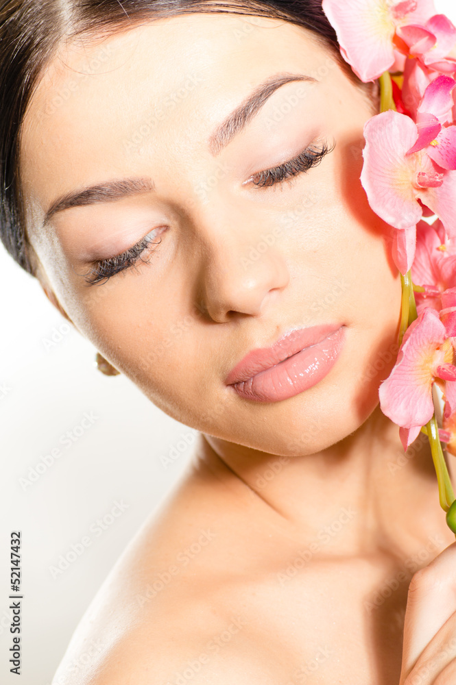 Beautiful girl face with eyes closed & pink flowers Beautiful girl face with eyes closed & pink flowers