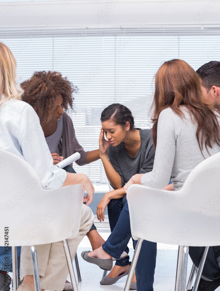 Therapist encouraging a patient Therapist encouraging a patient