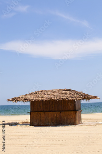 wooden house on the beach