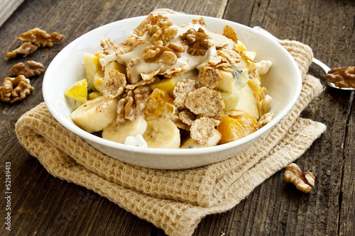 Muesli breakfast with fruits,yogurt and nuts